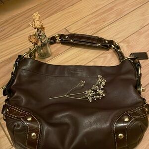 Vintage Coach bag dark chocolate brown color . Too many bags. Closet clear out.